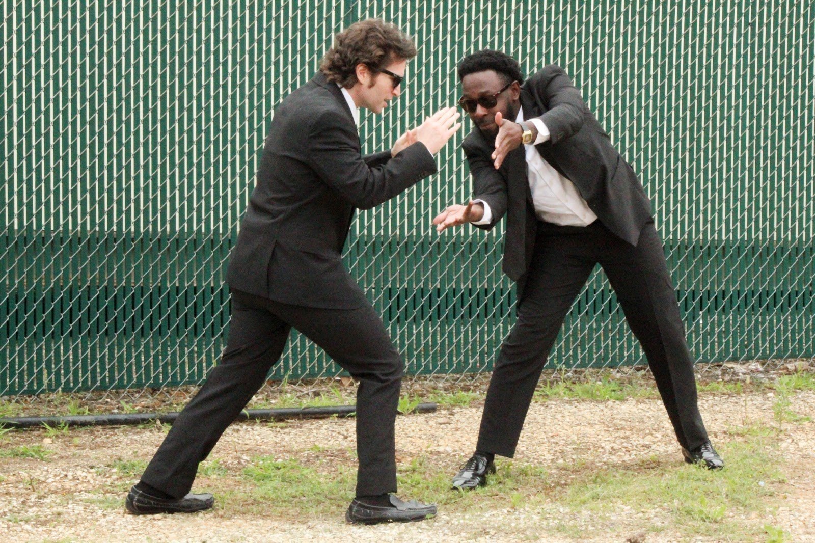 Two men doing improv gesture